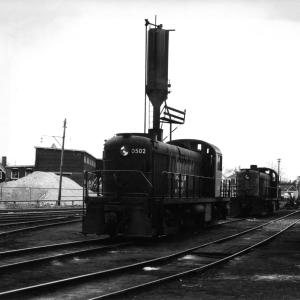 DERS-2b (RS-2) #0502 AT Taunton, MA in the 1960's.  DERS-2X in background, on sand track