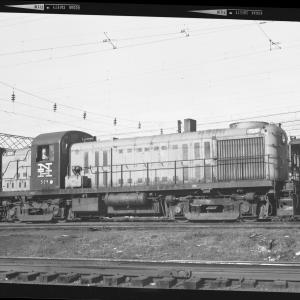 RS-3  #529  leading an FA unit under wire.  An MU car passes on a track behind the diesels