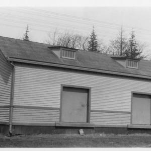 Street side of freight house with roof dormers