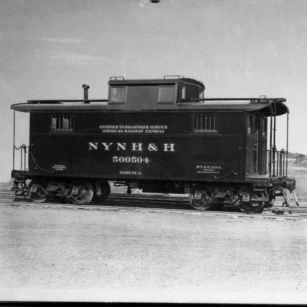 NE-3 Passenger Caboose #500504.  Railway Express Agency Lettering Under Road Name.