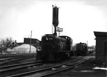 DERS-2b (RS-2) #0502 AT Taunton, MA in the 1960's.  DERS-2X in background, on sand track
