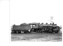 F-5 2-8-0 #163 (ex-CNE) at Waterbury, CT roundhouse in late 1940's.   Engineer's side view.