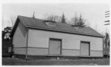 Street side of freight house with roof dormers